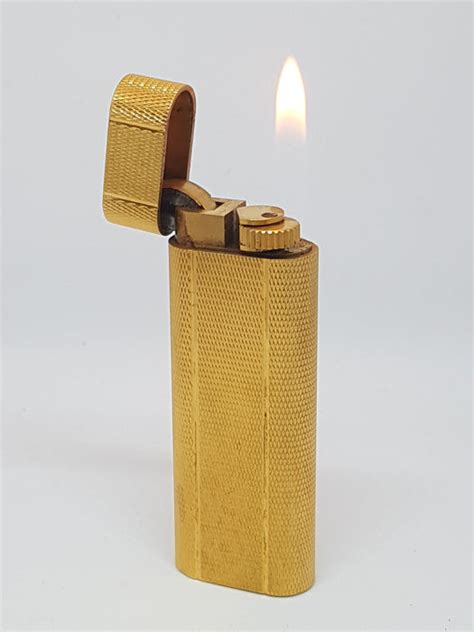 cartier gold 14k petrol lighter|cartier lighter price list.